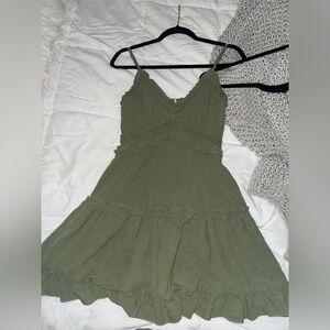 Green mini dress with ruffles